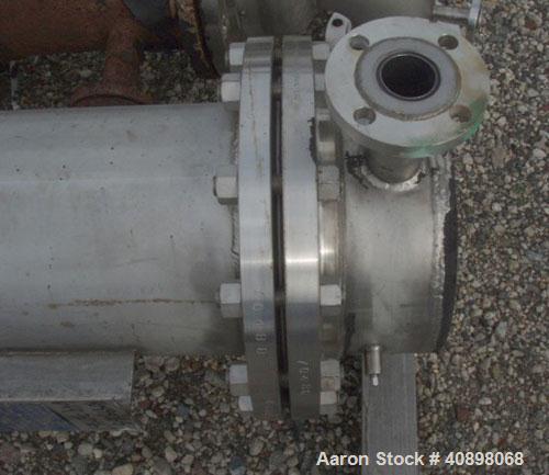 Used AstroCosmo Shell and Tube Heat Exchanger, 150 square feet , horizontal.Tantalum tubes, tube sheets and bonnets with (80) 3/4" diameter x 9' 6" long tubes rated 150 psi and full vacuum at 350 deg...