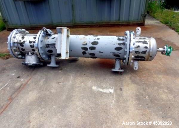 Used Astro Cosmos Shell & Tube Heat Exchanger, Approximate 69 Square Feet (6.5 Square Meter). Carbon steel shell approximate 450mm diameter x 1500mm long rated 8bar (116 psi)/Full Vacuum at 160 degre...