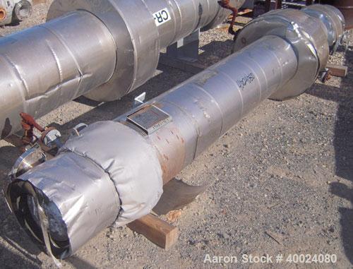 Used Atlas Single Pass Shell and Tube Heat Exchanger, 102 square feet, horizontal, type BEM10-120. Carbon steel shell rated 100 psi at 300 deg F, carbon steel baffles and expansion ring. (52) 3/4'' d...