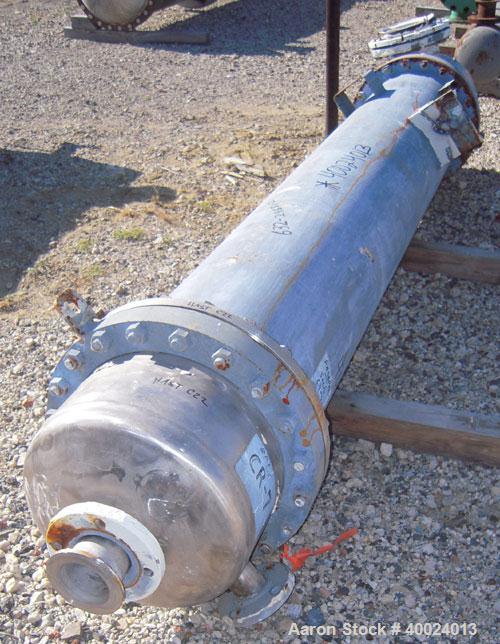 Used Atlas Shell And Tube Heat Exchanger, approximately 234 square feet, vertical. Carbon steel shell rated 100 psi at 300 deg.f., (163) 3/4" diameter x 7'6" long hastelloy C-22 tubes rated F.V. and ...