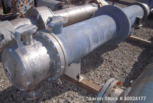 Used Atlas Single Pass Shell and Tube Heat Exchanger, 399 square feet, horizontal. Type BEM18-120. Carbon steel shell rated 100 psi at 300 deg F, carbon steel baffles and expansion ring. (208) 3/4" d...