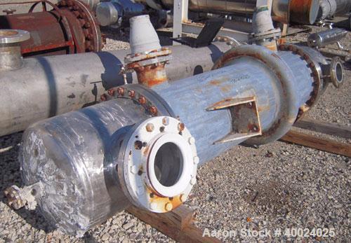 Used Atlas Shell and Tube Heat Exchanger, 405 square feet, vertical. Type BEM21-72. Carbon steel shell with expansion ring, rated 100 psi at 300 deg F, (345) 3/4'' diameter x 6' long Hastelloy C-22 t...