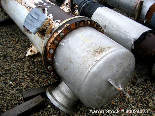 Used Atlas Shell and Tube Heat Exchanger, approximately 411 square feet, vertical. Type BEM22-72. Carbon steel shell rated 100 psi at 300 deg F, (350) 3/4'' diameter x 6' long Hastelloy C-22 tubes ra...