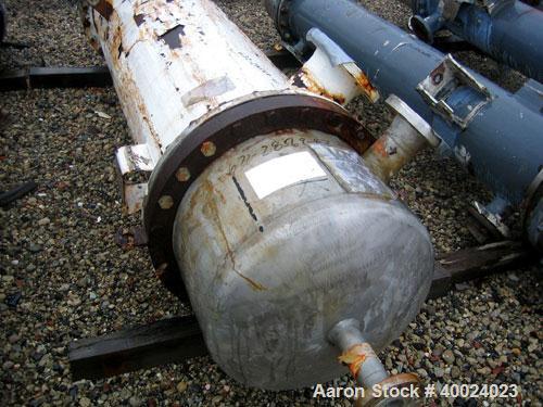 Used Atlas Shell and Tube Heat Exchanger, approximately 411 square feet, vertical. Type BEM22-72. Carbon steel shell rated 100 psi at 300 deg F, (350) 3/4'' diameter x 6' long Hastelloy C-22 tubes ra...