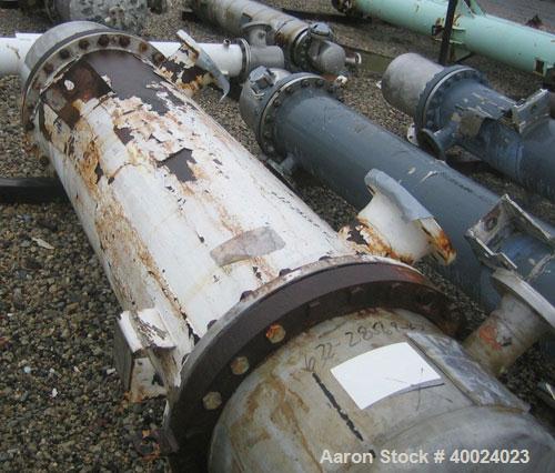 Used Atlas Shell and Tube Heat Exchanger, approximately 411 square feet, vertical. Type BEM22-72. Carbon steel shell rated 100 psi at 300 deg F, (350) 3/4'' diameter x 6' long Hastelloy C-22 tubes ra...