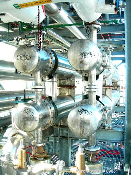 USED: Atlas four pass shell and tube heat exchanger, 561 square feet, horizontal. Hastelloy C276 shell rated FV and 150 psi at 400 deg F, (144) 3/4" diameter x 20' long Hastelloy C276 tubes rated FV ...