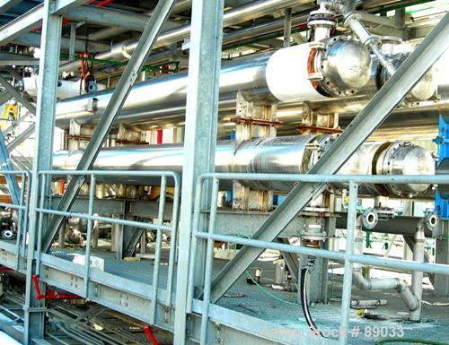 USED: Atlas four pass shell and tube heat exchanger, 561 square feet, horizontal. Hastelloy C276 shell rated FV and 150 psi at 400 deg F, (144) 3/4" diameter x 20' long Hastelloy C276 tubes rated FV ...
