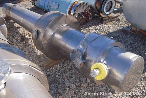 Used Atlas Single Pass Shell And Tube Heat Exchanger, 102 square feet, horizontal. Type BEM10-120. Carbon steel shell rated 100 psi at 300 deg.f., carbon steel baffles, and expansion ring. (52) 3/4" ...