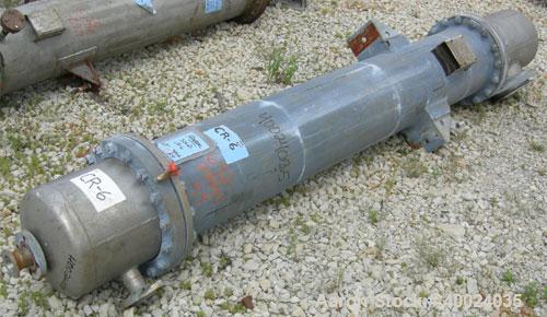 Used: Atlas shell and tube heat exchanger, approx 154 square feet, vertical. Carbon steel shell rated 100 psi at 300 deg.f.,(120) 3/4" diameter x 6'8" long hastelloy C-22 tubes rated F.V. and 100 psi...