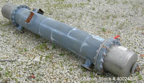 Used: Atlas shell and tube heat exchanger, approx 154 square feet, vertical. Carbon steel shell rated 100 psi at 300 deg.f.,(120) 3/4" diameter x 6'8" long hastelloy C-22 tubes rated F.V. and 100 psi...