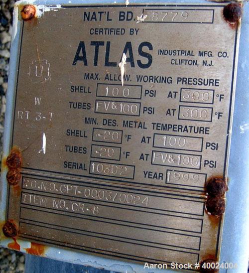 Used Atlas Shell and Tube Heat Exchanger, 167 square feet, vertical. Type BEM14-84.  Carbon steel shell rated 100 psi at 300 deg F, (122) 3/4" diameter x 7' long Hastelloy C22 tubes rated F.V. and 10...