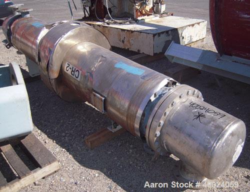 Used Atlas Single Pass Shell And Tube Heat Exchanger, 399 square feet, horizontal. Type BEM18-120. Carbon steel shell rated 100 psi at 300 deg.f., carbon steel baffles, and expansion ring. (208) 3/4"...