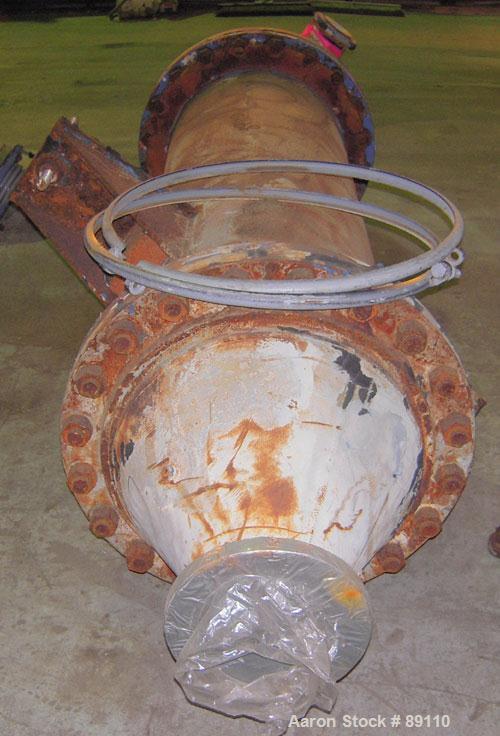 Used Cosmos Shell And Tube Heat Exchanger, 215 Square Feet, Type BEM 20-1-60, Vertical. Carbon steel shell rated 150 psi/FV at 400 deg F, tantalum tubes rated 150 psi/FV at 400 deg F.