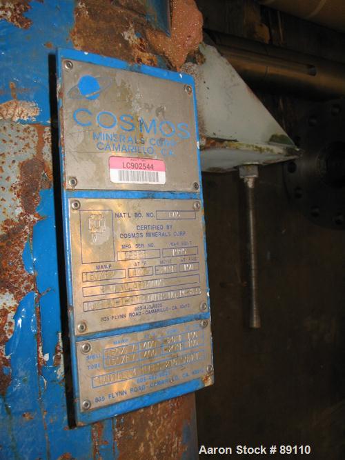 Used Cosmos Shell And Tube Heat Exchanger, 215 Square Feet, Type BEM 20-1-60, Vertical. Carbon steel shell rated 150 psi/FV at 400 deg F, tantalum tubes rated 150 psi/FV at 400 deg F.