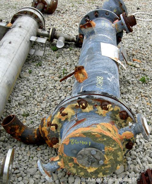 Used Cosmos Single Pass Shell And Tube Heat Exchanger, 123 square feet, vertical. Carbon steel shell rated 150 psi/FV at 400 deg F, (106) 3/4" diameter x 6' long tantalum tubes rated 150 psi at 400 d...