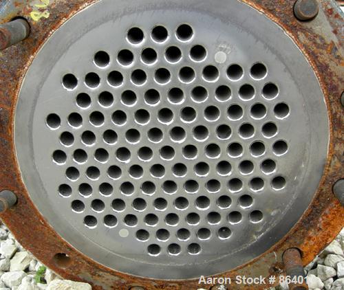 Used Cosmos Single Pass Shell And Tube Heat Exchanger, 123 square feet, vertical. Carbon steel shell rated 150 psi/FV at 400 deg F, (106) 3/4" diameter x 6' long tantalum tubes rated 150 psi at 400 d...