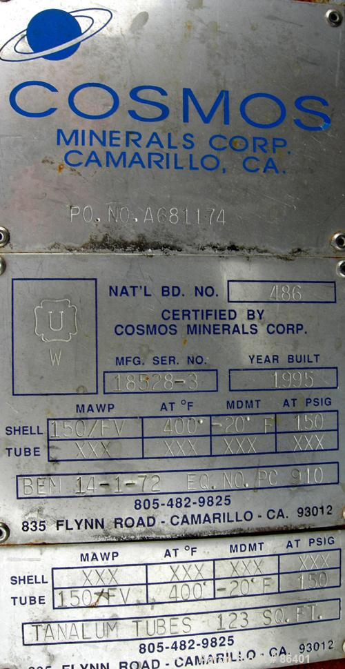 Used Cosmos Single Pass Shell And Tube Heat Exchanger, 123 square feet, vertical. Carbon steel shell rated 150 psi/FV at 400 deg F, (106) 3/4" diameter x 6' long tantalum tubes rated 150 psi at 400 d...