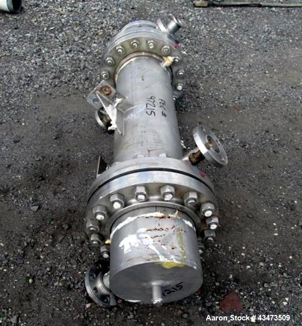 Used Cosmos Shell & Tube Heat Exchanger, 45 Square Feet. Hastelloy C22 tubes and bonnets. (76) 0.75" diameter x 32" long tubes rated 400 psi & Full Vacuum at 500 degrees F. 304 Stainless steel shell ...