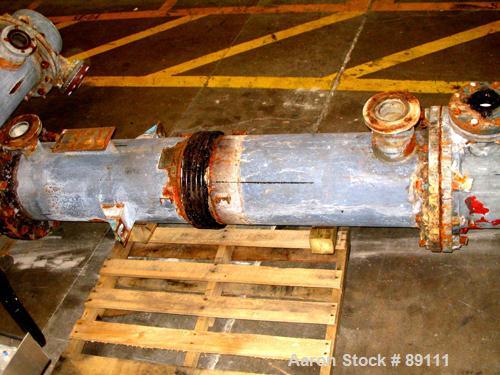 USED: Cosmos shell and tube heat exchanger, 123 square feet, horizontal. Carbon steel shell rated 150 psi/FV at 400 deg F, tantalum tubes rated 150 psi/FV at 400 deg F. Built 1994.