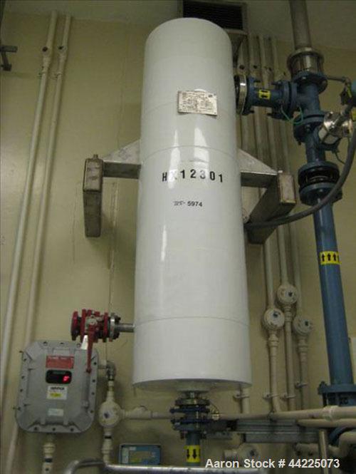 Used Doyle & Roth Vertical Heat Exchanger, 32 Square Feet, Model VT861-3VE. (55) 3/4" Diameter x 36" long Hastelloy C276 tubes rated 150 psi and full vacuum at 347 degrees F, 316L stainless steel she...