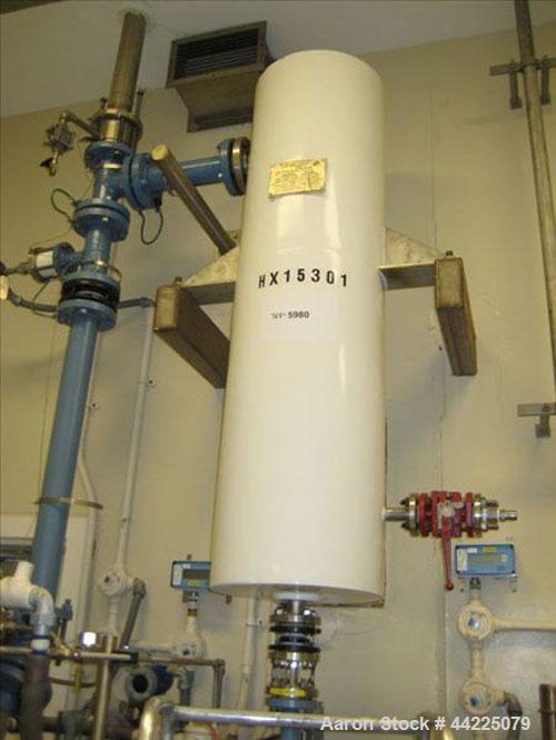 Used Doyle & Roth Vertical Heat Exchanger, 32 Square Feet, Model VT861-3VE. (55) 3/4" Diameter x 36" long Hastelloy C276 tubes rated 150 psi and full vacuum at 347 degrees F, 316L stainless steel she...