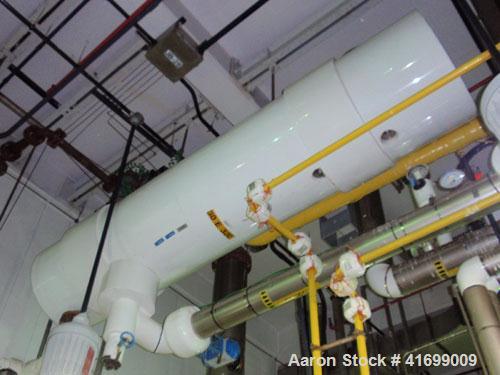 Used Doyle & Roth Shell and Tube Heat Exchanger, 495 square feet, horizontal. 304 stainless steel shell rated 150 psi at 350 deg F and –20 deg F at 150 psi. (421) 3/4" diameter x 6' long Haselloy C27...