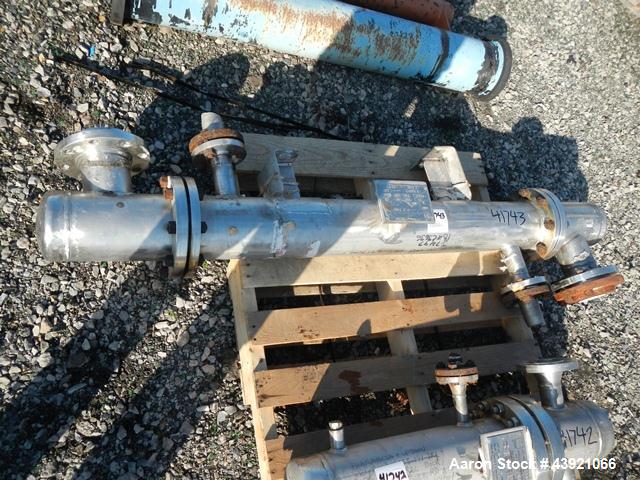 Used Doyle & Roth Shell & Tube Heat Exchanger, 13 Square Feet. Hastelloy C22 tubes, tube sheets and bonnet. (17) 0.75" Diameter x 48" long tubes rated 150 psi at +350/-100 degrees F. 304L Stainless s...
