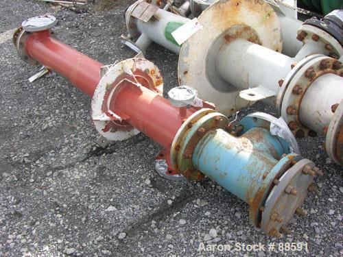USED: Doyle and Roth shell and tube heat exchanger, 43 square feet, vertical. Carbon steel shell rated 330 psi/FV at 600 deg F. (44) 5/8" diameter x 6' long Hastelloy C-276 tubes rated 150 psi/FV at ...