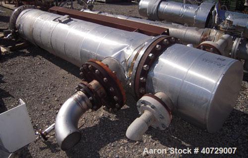 Used Horizontal Futura Titanium Corp 2 Pass Shell and Tube Heat Exchanger, 1143 square feet, type BEM 24-2-144