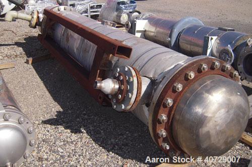 Used Horizontal Futura Titanium Corp 2 Pass Shell and Tube Heat Exchanger, 1143 square feet, type BEM 24-2-144
