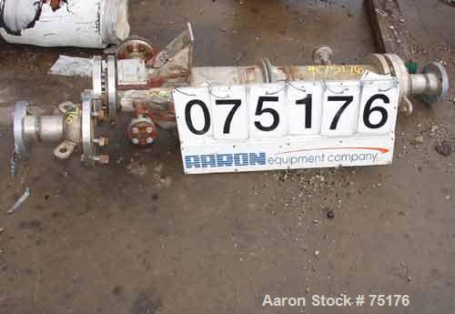 USED: Ketema single pass shell and tube heat exchanger, 23 sq ft, size 6-B-48, vertical. Stainless steel shell rated 150 psi at 350deg F, (30) 3/4" diameter x 4' long Carpenter 20 tubes rated 150 psi...