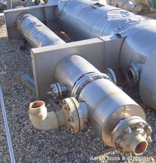 Used RAS Process Equipment 2 pass shell and tube heat exchanger, 193 square feet, horizontal. Type BEM 10-144. 316L stainless steel shell rated 50 psi/FV at 180 deg F. (82) 3/4" diameter x 12' long H...