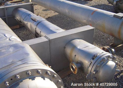Used RAS Process Equipment 2 Pass Shell and Tube Heat Exchanger, 193 square feet, horizontal, type BEM 10-144. 316L stainless steel shell rated 50 psi/FV at 180 deg F. (82) 3/4'' diameter x 12' long ...