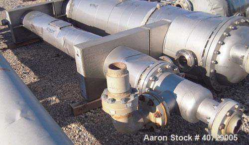 Used RAS Process Equipment 2 Pass Shell and Tube Heat Exchanger, 193 square feet, horizontal, type BEM 10-144. 316L stainless steel shell rated 50 psi/FV at 180 deg F. (82) 3/4'' diameter x 12' long ...