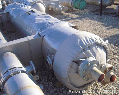 Used RAS Process Equipment 6 Pass Shell and Tube Heat Exchanger, 608 square feet, horizontal, type BEM 23-144. 316L stainless steel shell rated 50 psi/FV at 340 deg F. (258) 3/4'' diameter x 12' long...