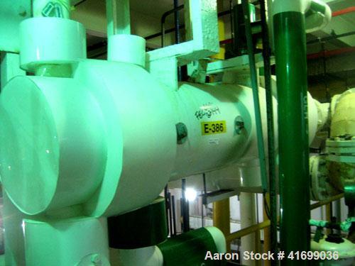Used Perry Products Heat Exchanger, 99 square feet, model 12-99-FTSX. Hastelloy C276 tubes, tube sheet, and bonnets. (126) 3/4'' diameter x 4' long tubes rated 100 psi or FV at 320 deg F, carbon stee...