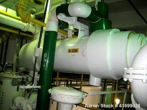 Used Perry Products Heat Exchanger, 166 square feet. Hastelloy C276 tubes, tube sheet, and bonnets. (212) 3/4" diameter x 4' long tubes rated 75 psi/FV at 320 deg F, carbon steel shell rated 100 psi ...