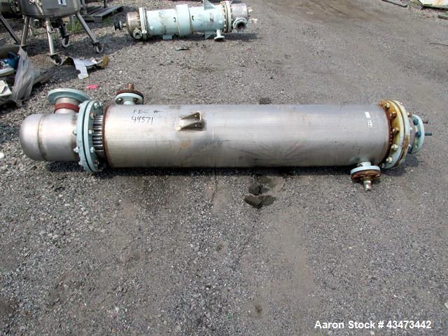 Used Pfaudler Shell & Tube Heat Exchanger, 153 Square Feet. Hastelloy C276 tubes and bonnets, 316L stainless steel tube sheets with (130) 0.75" diameter x 6' long tubes rated 75 psi at 350 degrees F....