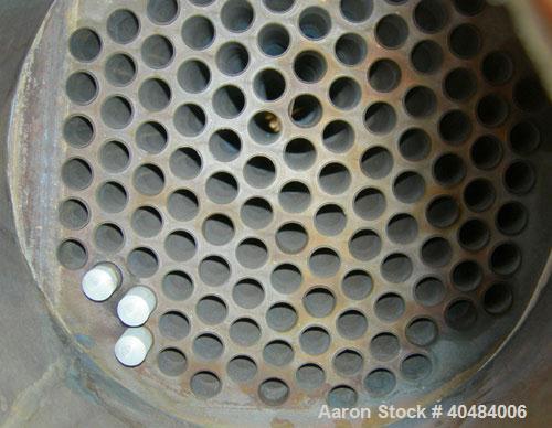 Used: Pfizer Monel shell and tube heat exchanger, approximately 241 square feet, horizontal. Carbon steel shell rated 150 psi at -55 to 350 deg F. (126) 3/4" diameter x 10' long Monel M-400 tubes rat...