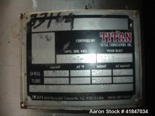 Used Titan Metal Fabricators Shell And Tube Heat Exchanger, 219 Square Feet, Vertical. 304L Stainless steel shell rated FV/150 psi at –20 to 400 deg F. (140) 3/4" diameter x 8’ long Hastelloy C-276 t...