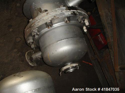 Used Titan Metal Fabricators Shell and Tube Heat Exchanger, 219 square feet, vertical. 304L Stainless steel shell rated FV/150 psi at –20 to 400 deg F. (140) 3/4'' diameter x 8’ long Hastelloy C-276 ...