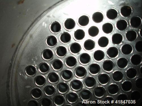 Used Titan Metal Fabricators Shell and Tube Heat Exchanger, 219 square feet, vertical. 304L Stainless steel shell rated FV/150 psi at –20 to 400 deg F. (140) 3/4'' diameter x 8’ long Hastelloy C-276 ...