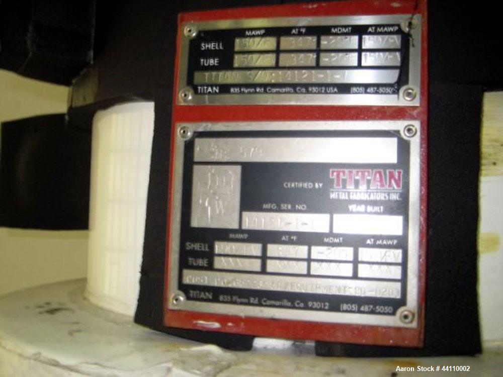 Used Titan Metal Fabricators Tantalum Vertical Heat Exchanger / Condenser, Approximate 80 Square Feet. Shell rated 150 psi & Full Vacuum at 347 degrees F, tubes rated 150 psi & Full Vacuum at 347 deg...