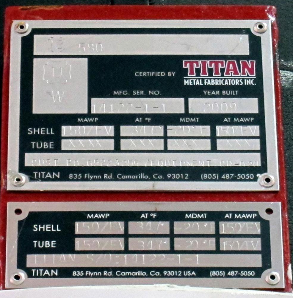 Used Titan Metal Fabricators Tantalum Vertical Heat Exchanger / Condenser, Approximate 80 Square Feet. Shell rated 150 psi & Full Vacuum at 347 degrees F, tubes rated 150 psi & Full Vacuum at 347 deg...