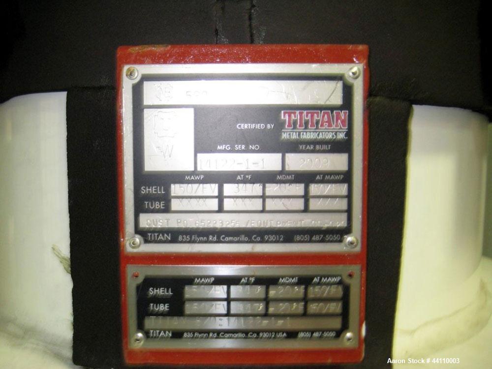 Used Titan Metal Fabricators Tantalum Vertical Heat Exchanger / Condenser, Approximate 80 Square Feet. Shell rated 150 psi & Full Vacuum at 347 degrees F, tubes rated 150 psi & Full Vacuum at 347 deg...