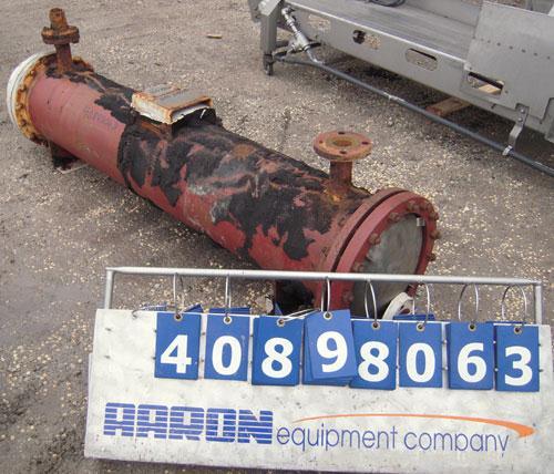 Used Titanium Industries Shell and Tube Heat Exchanger, 151 square feet, horizontal. Tema Type BEM, Tema Size 14-72. Carbon steel shell rated 75 psi at 350 deg F, (129 ) 3/4'' diameter x 6' long Zirc...