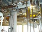 Used: Atlas shell and tube heat exchanger, approx 168 square feet, horizontal. Carbon steel shell rated 100 psi at 300 deg.f.,(97) 3/4