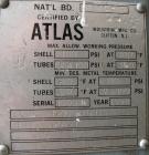 Used: Atlas shell and tube heat exchanger, approx 234 square feet, vertical. Carbon steel shell rated 100 psi at 300 deg.f.,(163) 3/4