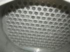 Used: Atlas shell and tube heat exchanger, approx 234 square feet, vertical. Carbon steel shell rated 100 psi at 300 deg.f.,(163) 3/4