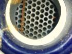 Used Allegheny Bradford Shell and Tube Heat Exchanger, 128 square feet, vertical. 304L Stainless steel shell rated 150 psi at –20 to 350 deg F. (109) 3/4